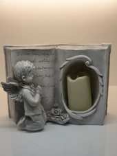 Open Book with cherub and candle 